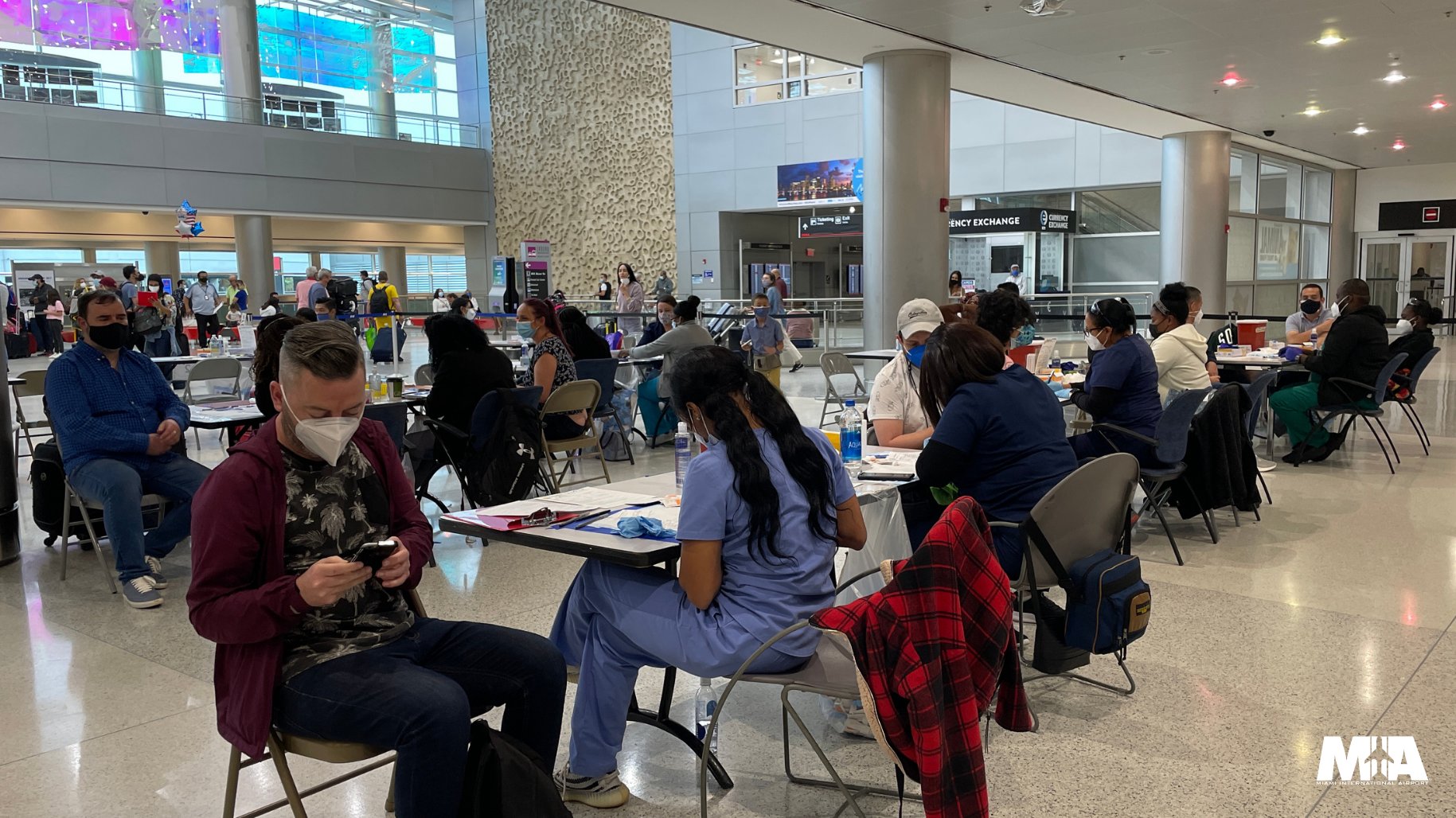 vacunación en Aeropuerto de Miami